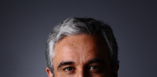 EKREM BUĞRA EKİNCİ KİMDİR?