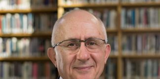 TANER AKÇAM KİMDİR?